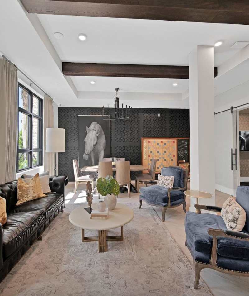 Clubhouse with multiple sofas and chairs at Palmera in Doral, Florida