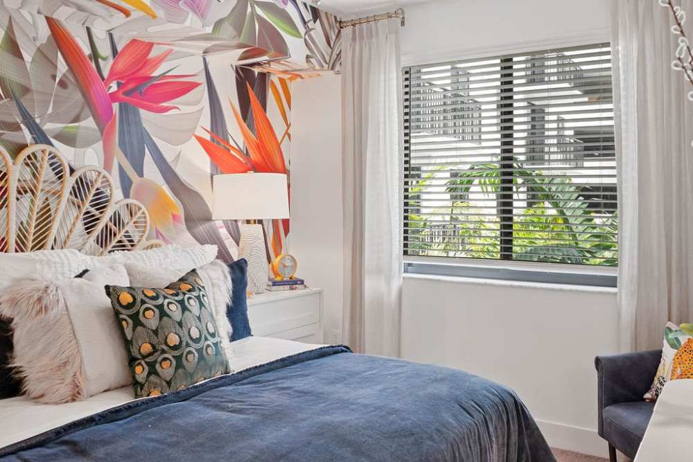 Bedroom with large windows at Palmera in Doral, Florida