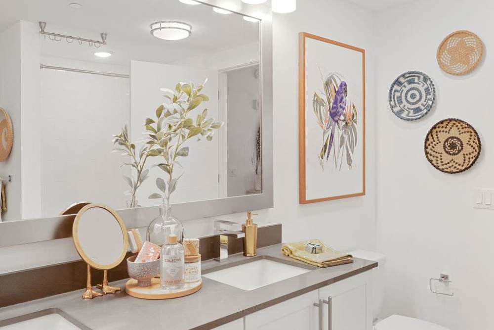 Bathroom with double vanity sinks at Palmera in Doral, Florida