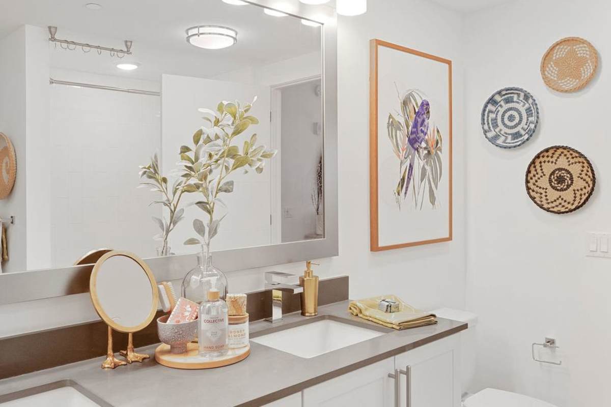 Bathroom with double sinks at Palmera in Doral, Florida