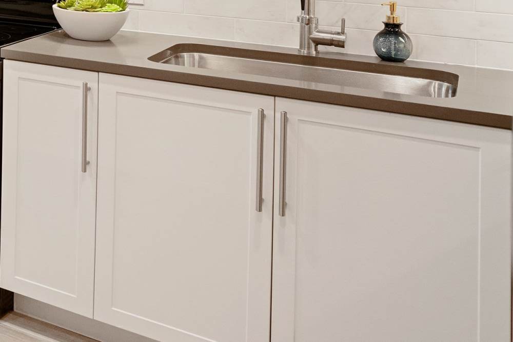 Slate Or Alpine White Cabinets With Brushed Nickel Bar Pulls at Palmera in Doral, Florida